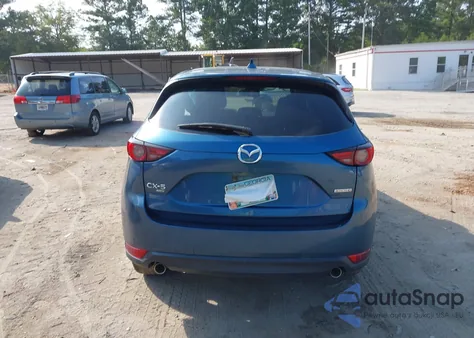 2021 Mazda Cx-5 Grand Touring z USA, uszkodzony, nr VIN JM3KFBDM5M0343058